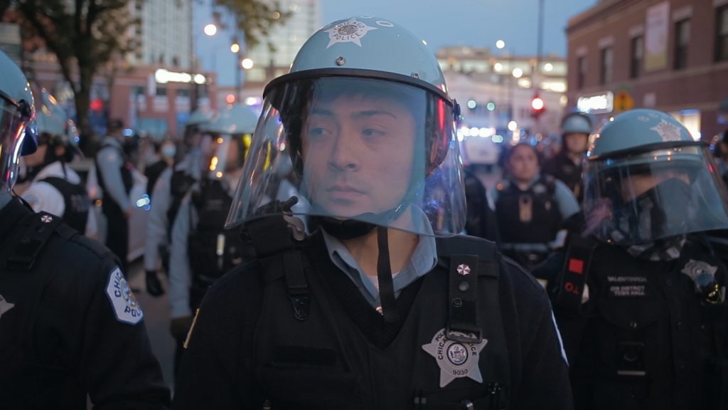 A police officer during a protest in Steve James' CITY SO REAL.