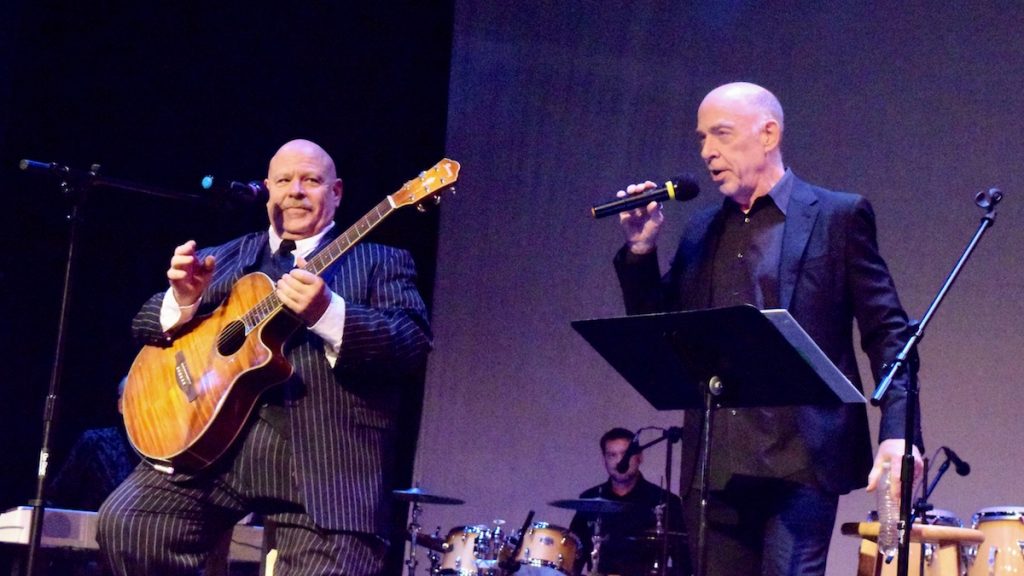 UBU Project Founder David Simmons and actor JK Simmons perform a song at the "Light Your Corner of the World" benefit concert. (Photo: Kristy Sproul)